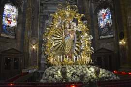 Italy - Surrounded by flowers, Mary walks the streets of the world